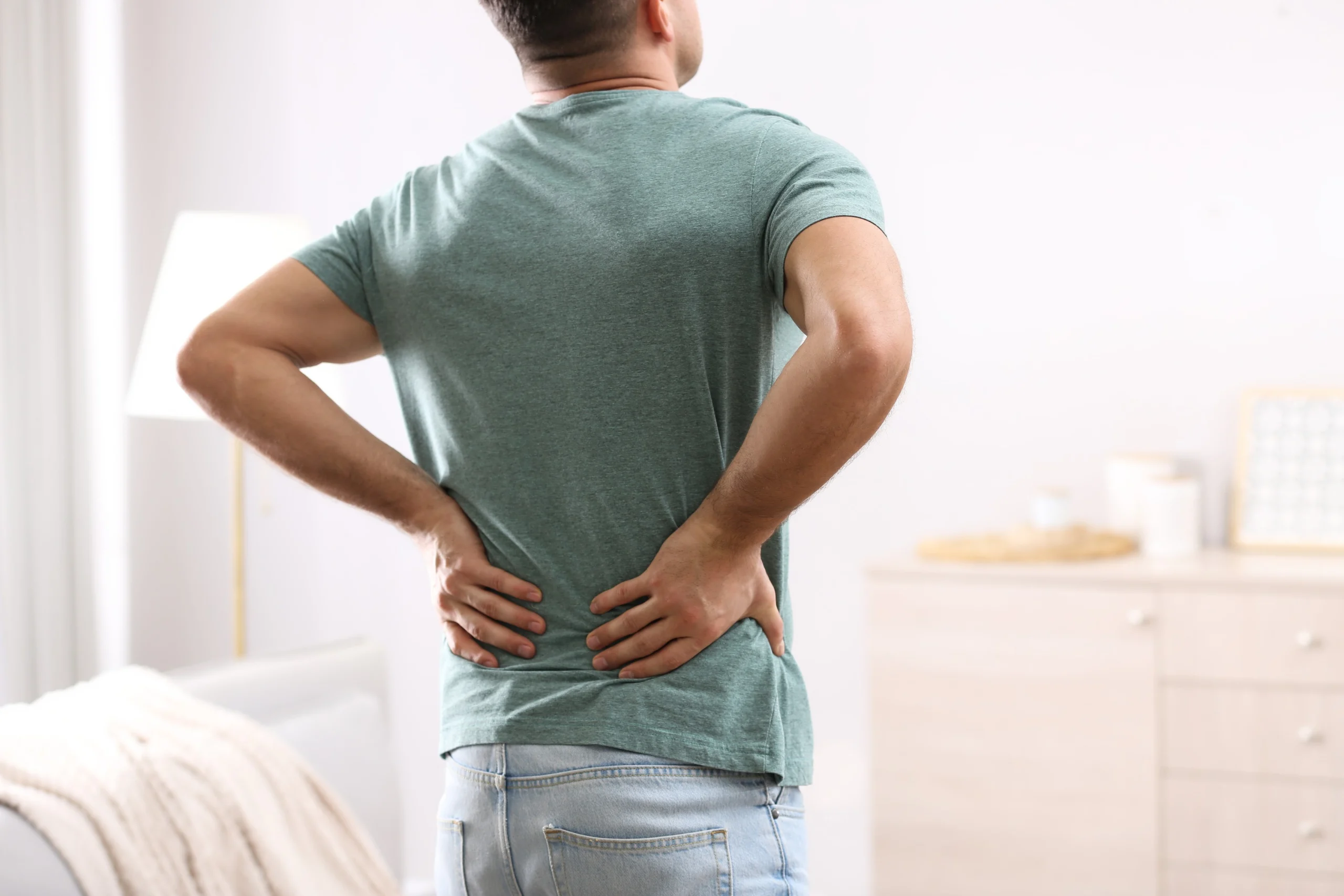 Man displaying back-pain