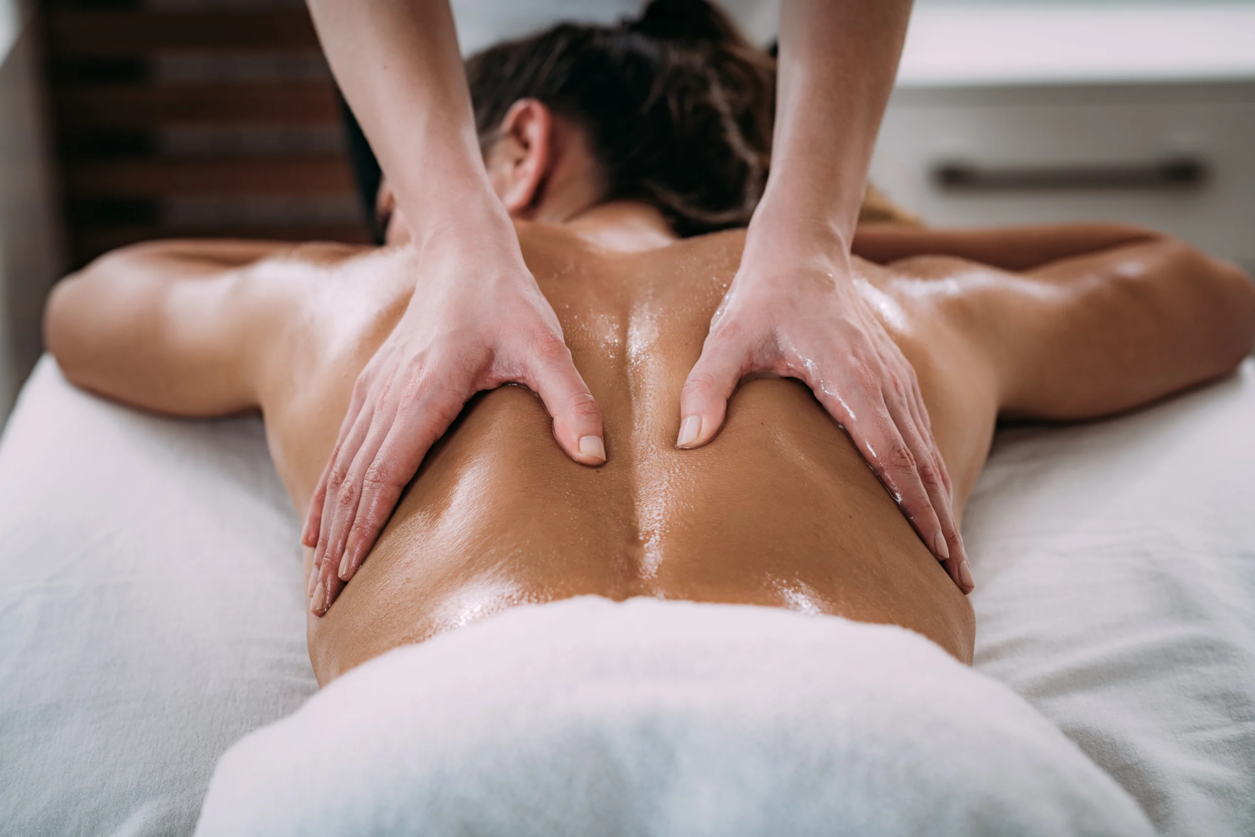 A woman getting a back massage